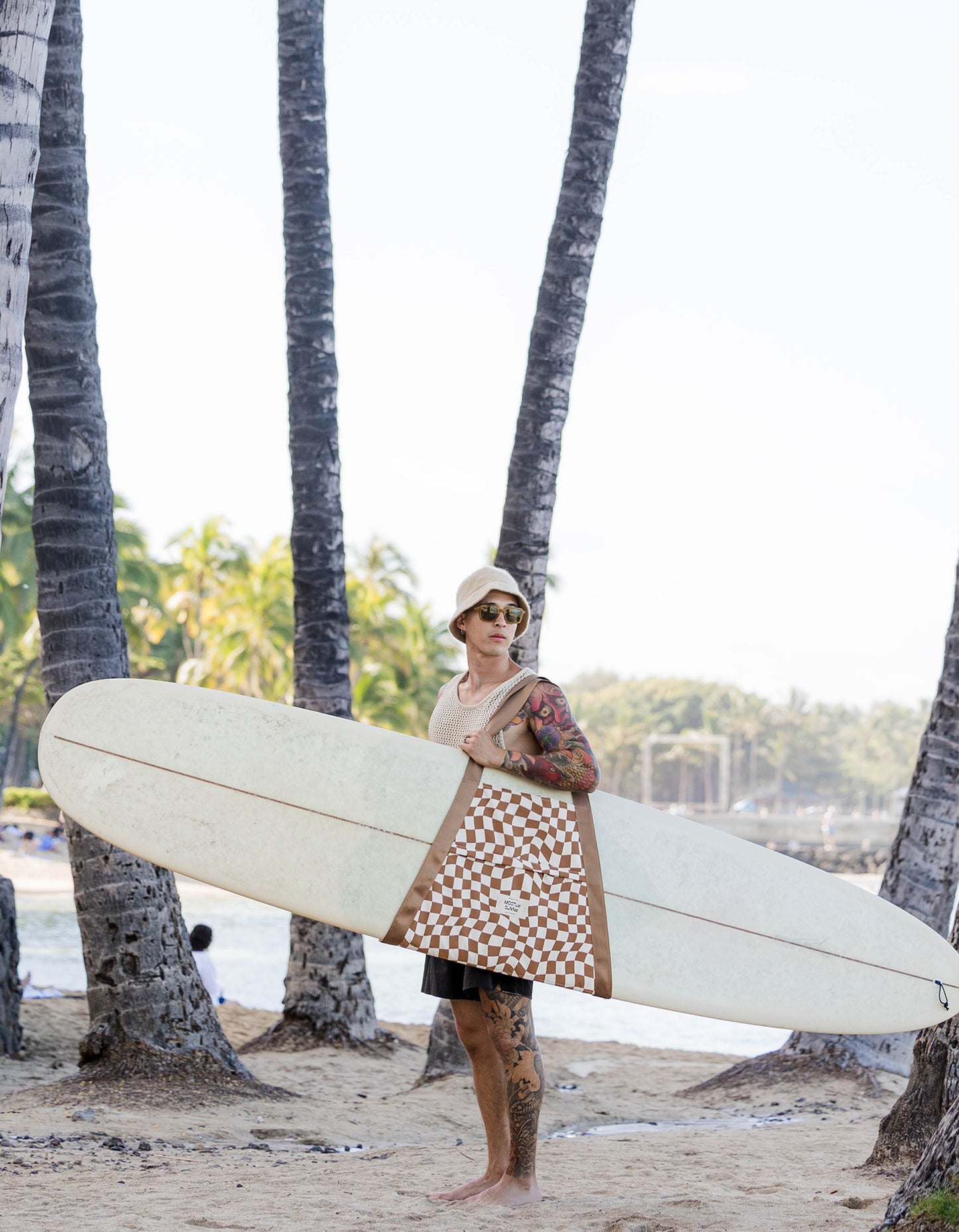 Mostly Sunny- Surfboard Sling in Brown Checker @its__mostlysunny